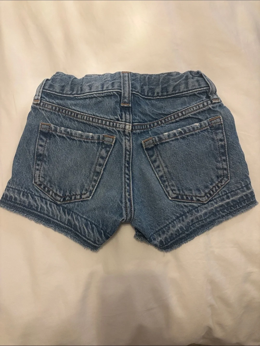 GAP kids Low-Rise Distressed Denim Shorts - Blue size 6 kids